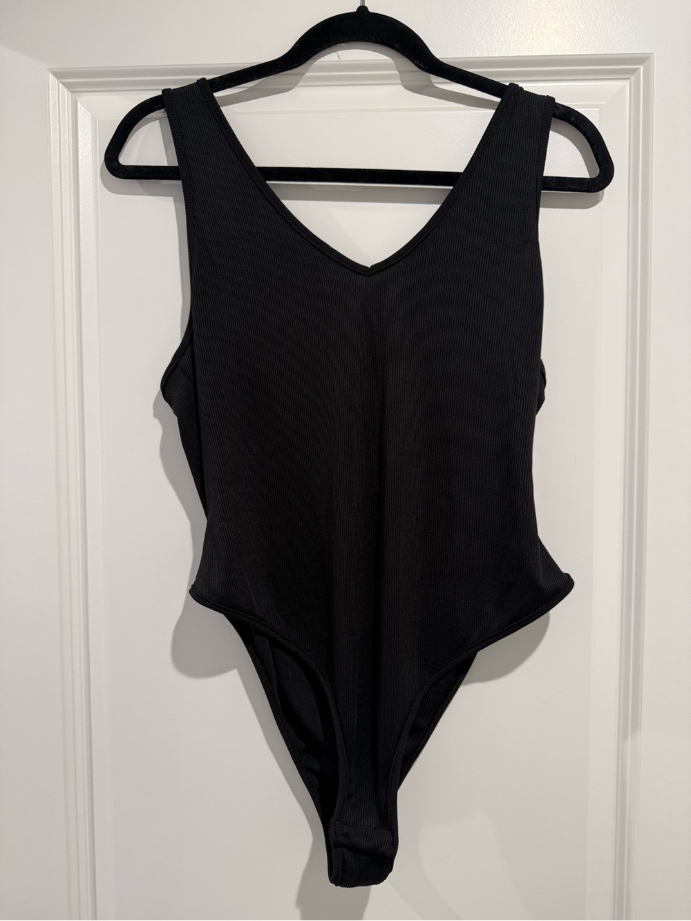 SHEIN Black Ribbed One-Piece Bodysuit